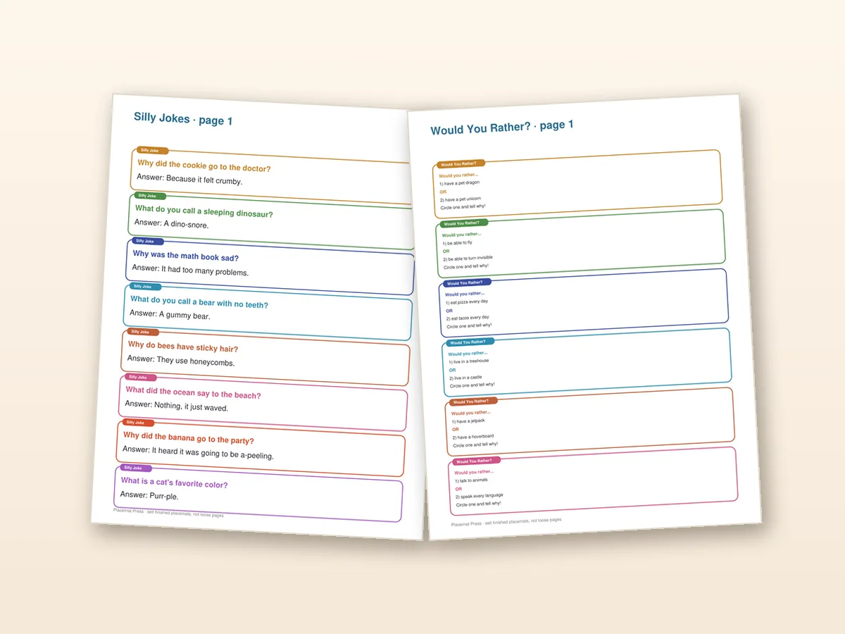 Would-you-rather prompts, jokes and game boards from the kit laid out on a table